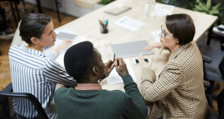 Financial Advisor talking to couple