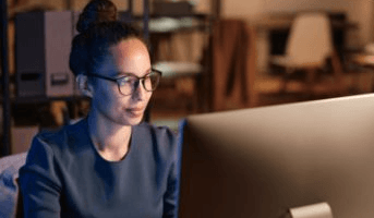 woman looking at computer