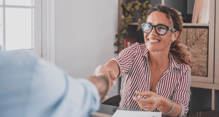 woman shaking hands with someone